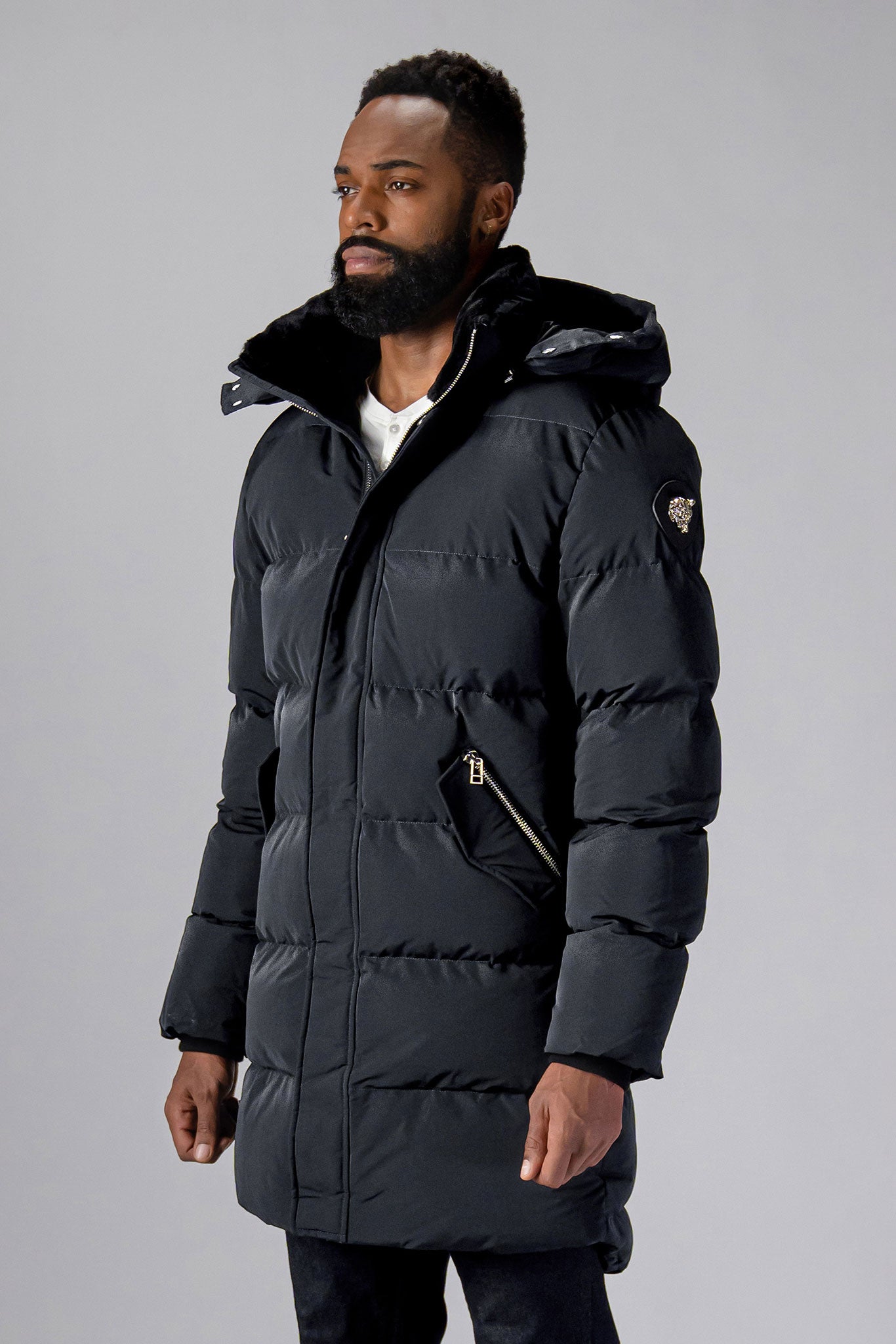 Woodpecker Men's Penguin Long Winter coat. High-end Canadian designer winter coat for men in "Black Diamond" navy blue colour. Woodpecker cruelty-free winter coat designed in Canada. Men's heavy weight long length premium designer jacket for winter. Superior quality warm winter coat for men. Moose Knuckles, Canada Goose, Mackage, Montcler, Will Poho, Willbird, Nic Bayley