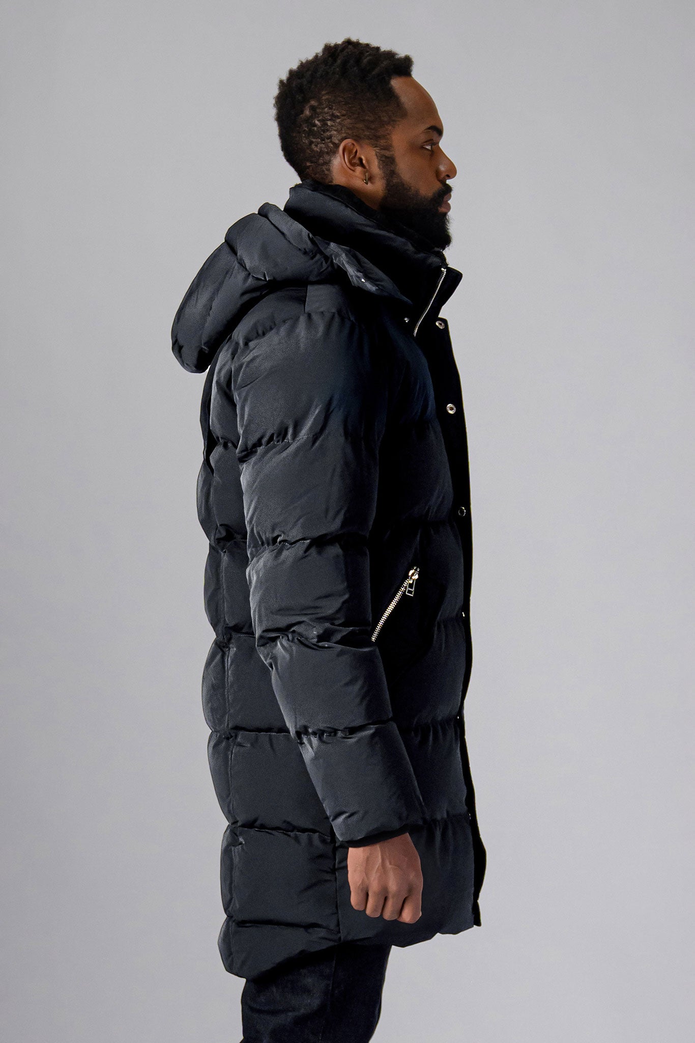 Woodpecker Men's Penguin Long Winter coat. High-end Canadian designer winter coat for men in "Black Diamond" colour. Woodpecker cruelty-free winter coat designed in Canada. Men's heavy weight long length premium designer jacket for winter. Superior quality warm winter coat for men. Moose Knuckles, Canada Goose, Mackage, Montcler, Will Poho, Willbird, Nic Bayley. Extra warm. Shiny parka. Stylish winter jacket. Designer winter coat.
