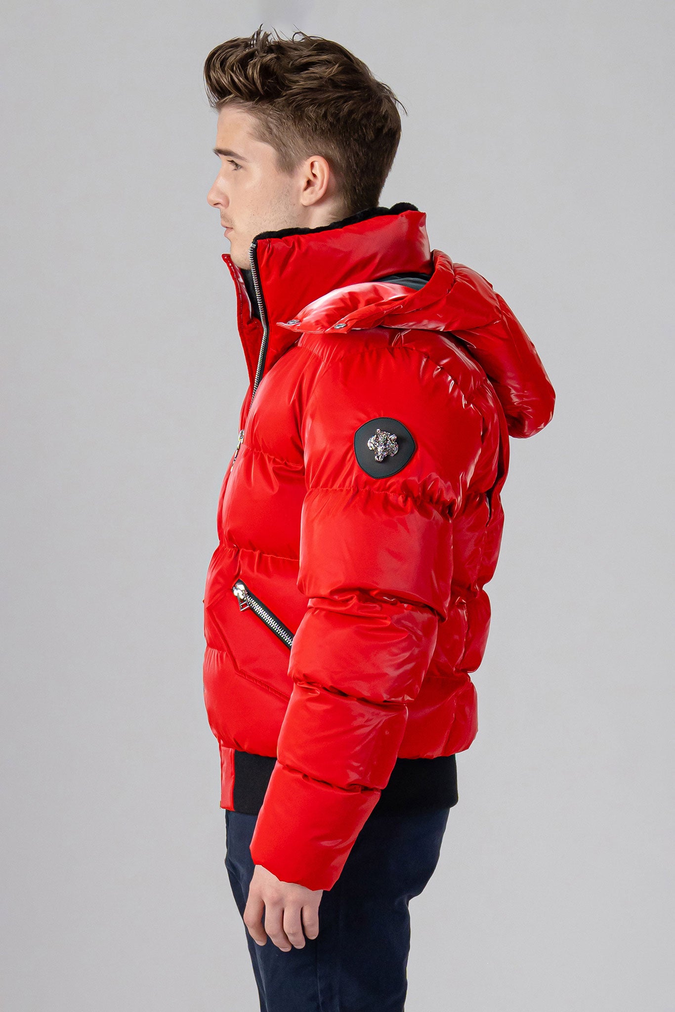 Woodpecker Men's Woody Bomber Winter coat. High-end Canadian designer winter coat for men in “Fashion Santa" colour. Woodpecker cruelty-free winter coat designed in Canada. Men's heavy weight short length premium designer jacket for winter. Superior quality warm winter coat for men. Moose Knuckles, Canada Goose, Mackage, Montcler, Will Poho, Willbird, Nic Bayley. Shiny parka. Stylish winter jacket. Designer winter coat.