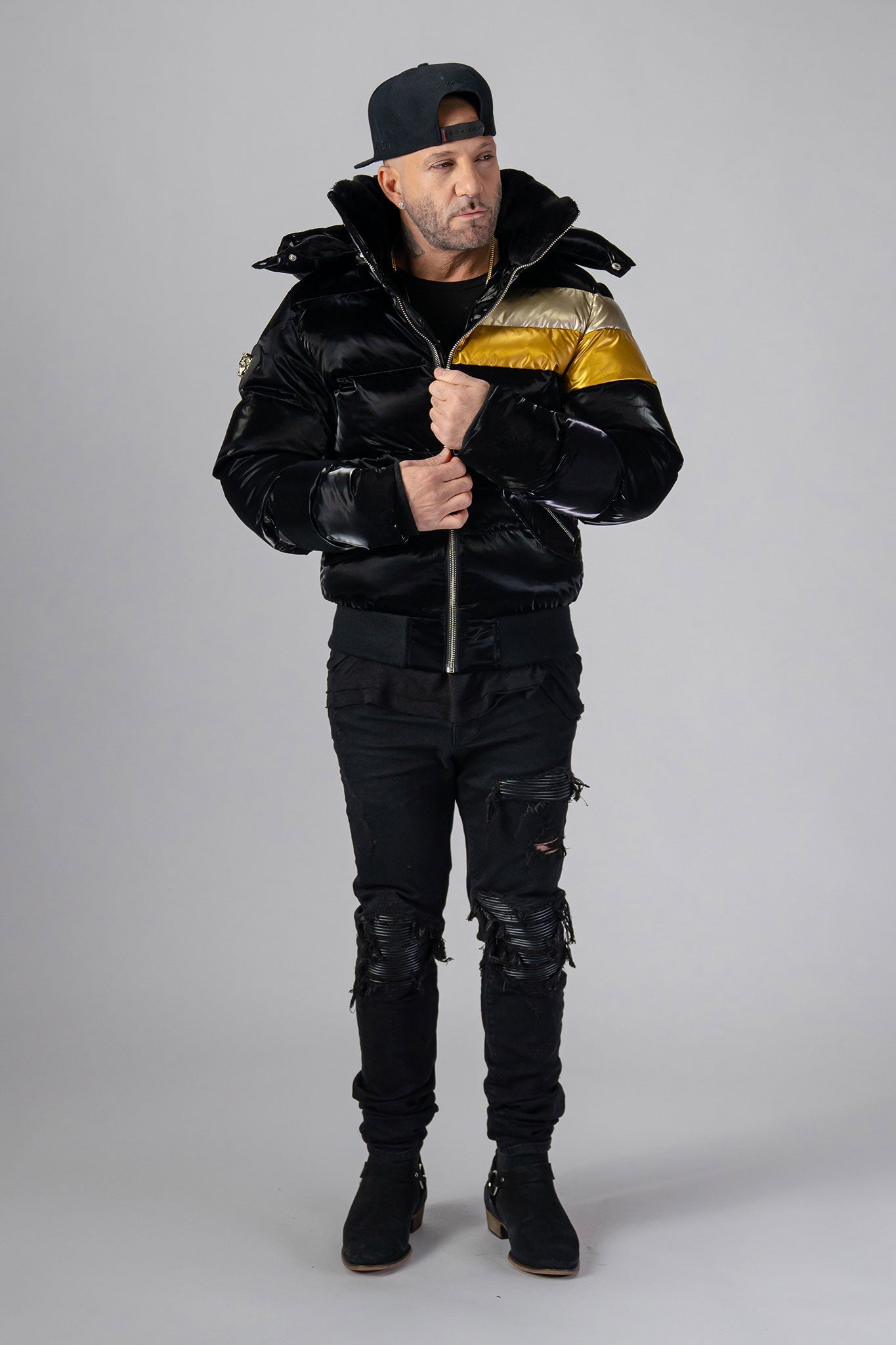 Woodpecker Men's Woody Bomber Winter coat. High-end Canadian designer winter coat for men in “Firebird" colour. Woodpecker cruelty-free winter coat designed in Canada. Men's heavy weight short length premium designer jacket for winter. Superior quality warm winter coat for men. Moose Knuckles, Canada Goose, Mackage, Montcler, Will Poho, Willbird, Nic Bayley. Shiny parka. Stylish winter jacket. Designer winter coat.