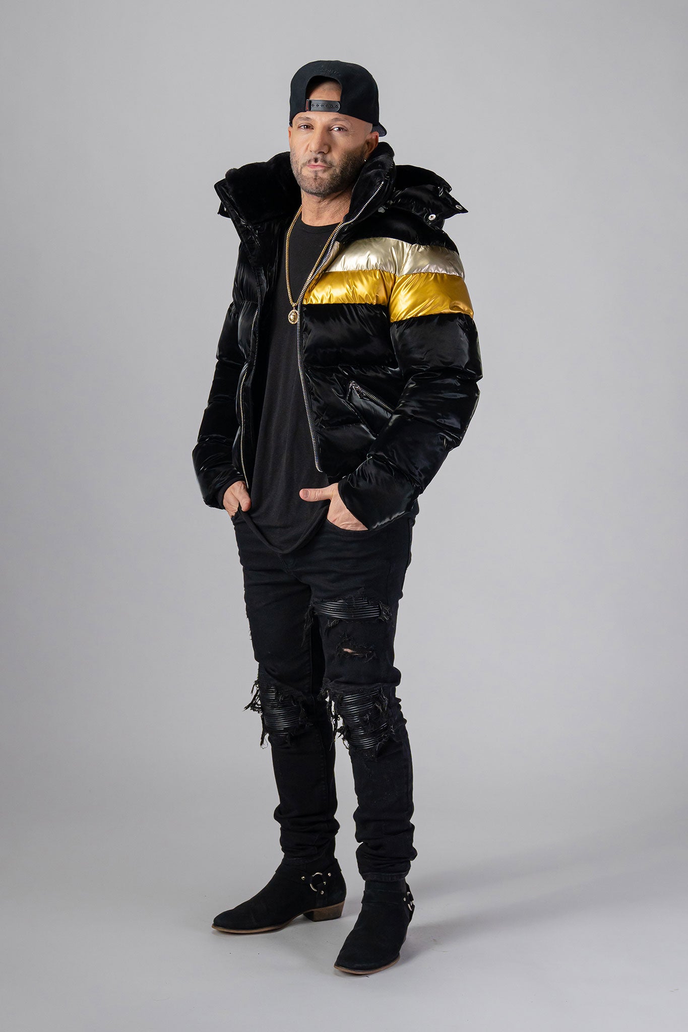 Woodpecker Men's Woody Bomber Winter coat. High-end Canadian designer winter coat for men in “Firebird" colour. Woodpecker cruelty-free winter coat designed in Canada. Men's heavy weight short length premium designer jacket for winter. Superior quality warm winter coat for men. Moose Knuckles, Canada Goose, Mackage, Montcler, Will Poho, Willbird, Nic Bayley. Shiny parka. Stylish winter jacket. Designer winter coat.