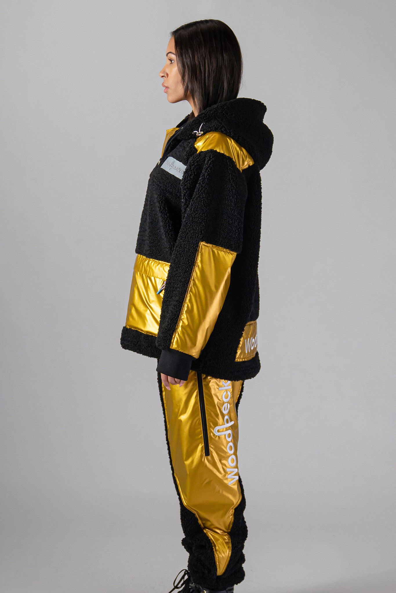 Woodpecker Unisex Fleece Hoodie. High-end Canadian designer winter fleece in "Gold" colour. Woodpecker fleece designed in Canada. Warm premium designer fleece for winter. Superior quality warm fleece hoodie. Moose Knuckles, Canada Goose, Mackage, Montcler, Will Poho, Willbird, Nic Bayley. Cozy for at-home wear.