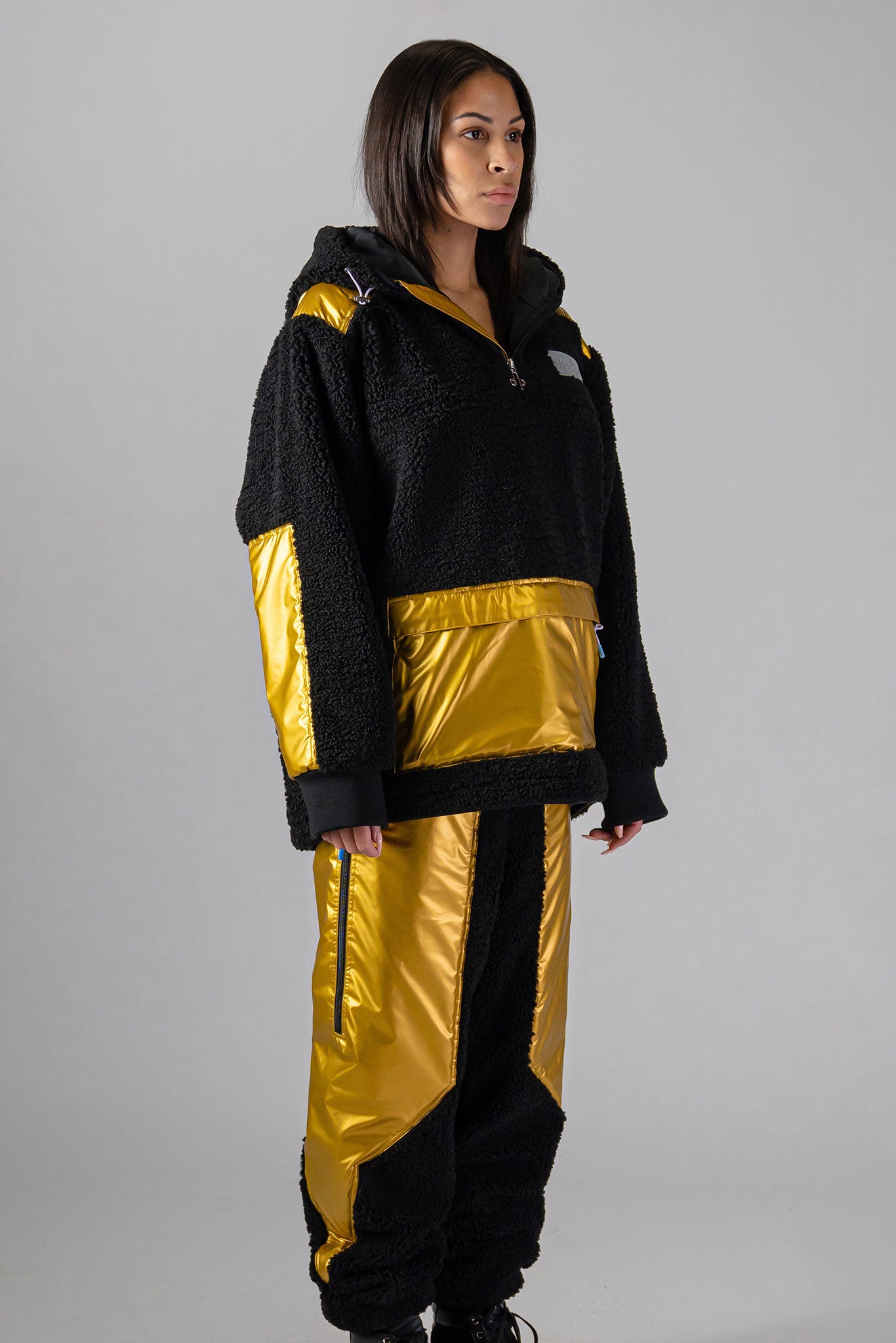 Woodpecker Unisex Fleece Track Pants. High-end Canadian designer winter fleece in "Gold" colour. Woodpecker fleece pants designed in Canada. Warm premium designer fleece pants for winter. Superior quality warm fleece track pants. Moose Knuckles, Canada Goose, Mackage, Montcler, Will Poho, Willbird, Nic Bayley. Cozy for at-home wear.