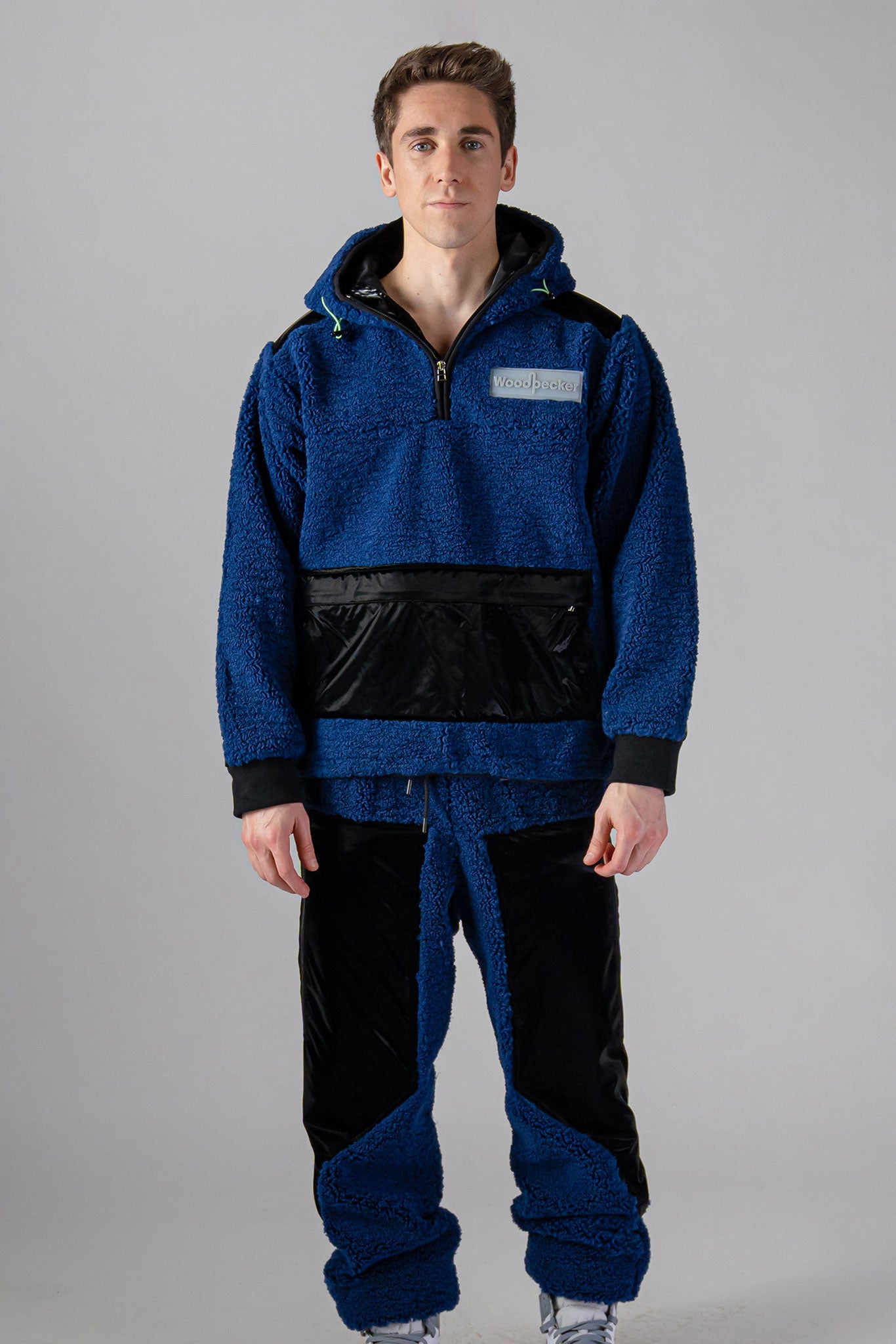 Woodpecker Unisex Fleece Track Pants. High-end Canadian designer winter fleece in "Navy" colour. Woodpecker fleece pants designed in Canada. Warm premium designer fleece pants for winter. Superior quality warm fleece track pants. Moose Knuckles, Canada Goose, Mackage, Montcler, Will Poho, Willbird, Nic Bayley. Cozy for at-home wear.