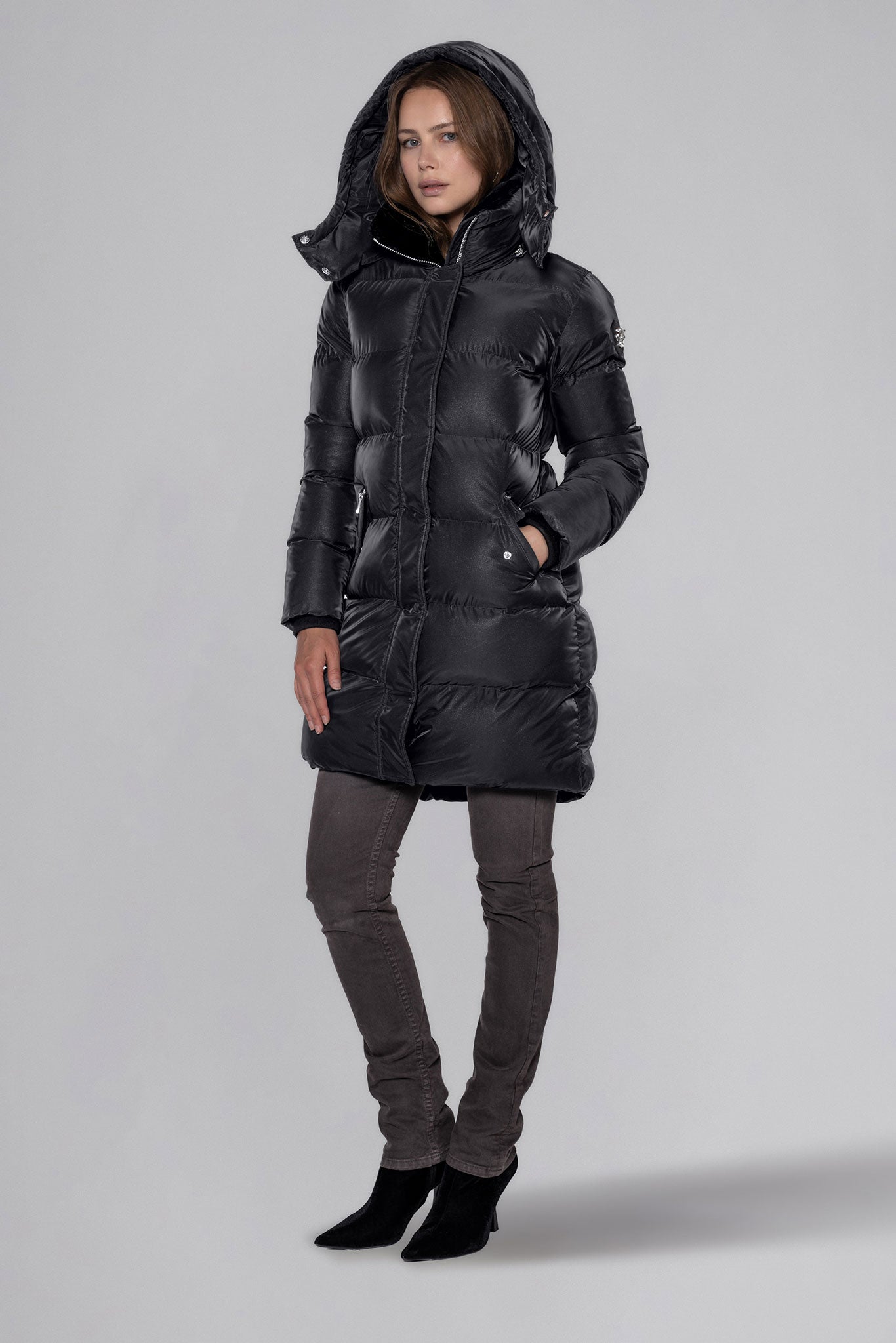 Woodpecker Women's Penguin Long Winter coat. High-end Canadian designer winter coat for women in "Black Diamond" colour. Woodpecker cruelty-free winter coat designed in Canada. Women's heavy weight long length premium designer jacket for winter. Superior quality warm winter coat for women. Moose Knuckles, Canada Goose, Mackage, Montcler, Will Poho, Willbird, Nic Bayley. Extra warm. Shiny parka. Stylish winter jacket. Designer winter coat.