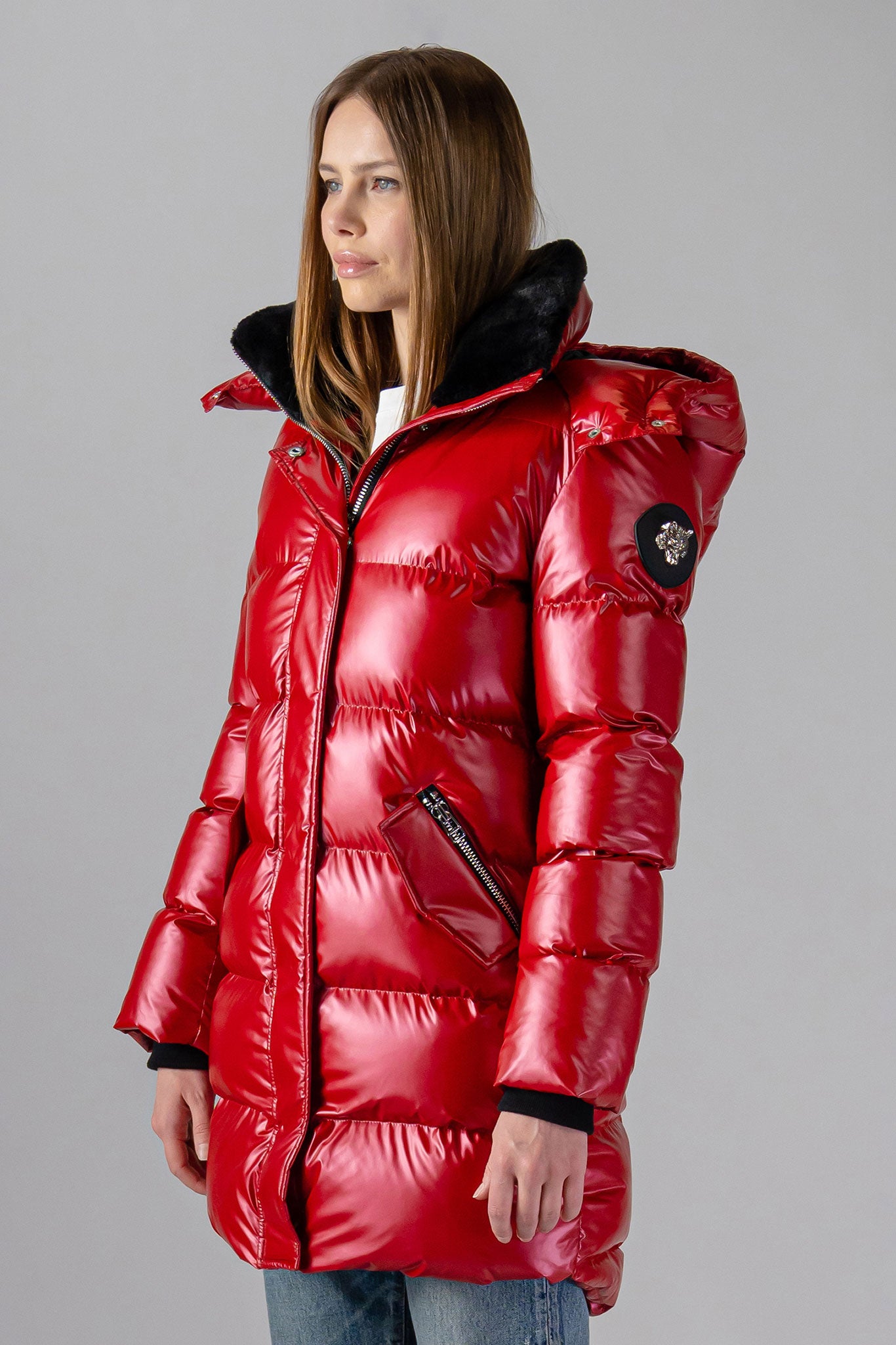 Woodpecker Women's Penguin Long Winter coat. High-end Canadian designer winter coat for women in "Raspberry" colour. Woodpecker cruelty-free winter coat designed in Canada. Women's heavy weight long length premium designer jacket for winter. Superior quality warm winter coat for women. Moose Knuckles, Canada Goose, Mackage, Montcler, Will Poho, Willbird, Nic Bayley. Extra warm. Shiny parka. Stylish winter jacket. Designer winter coat.