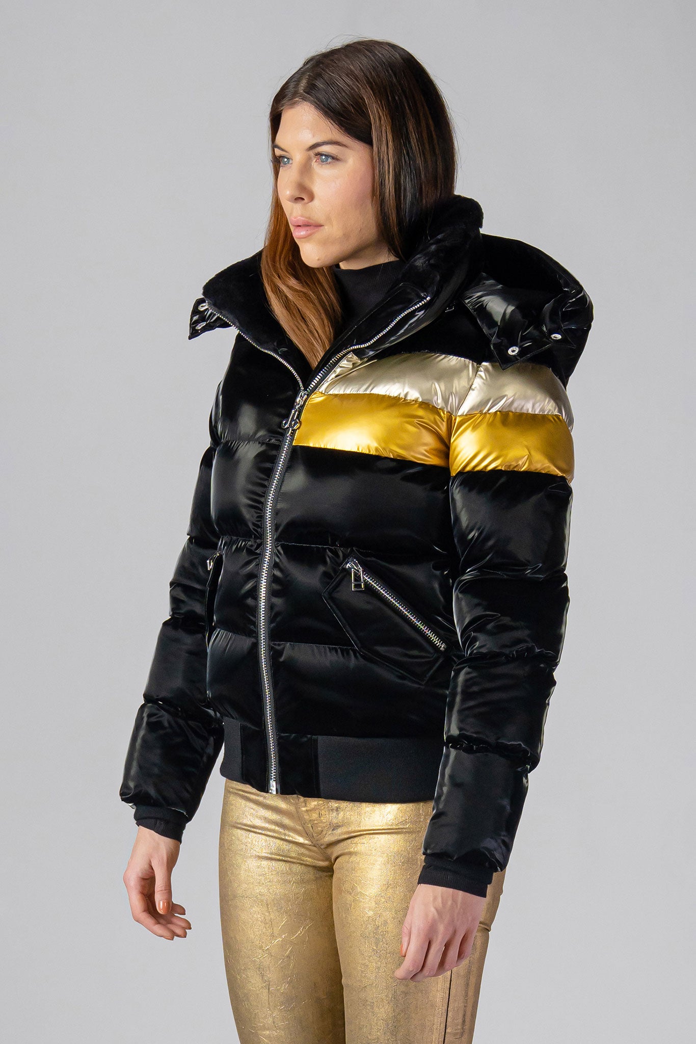 Woodpecker Women's Woody Bomber Winter coat. High-end Canadian designer winter coat for women in "Firebird" colour. Woodpecker cruelty-free winter coat designed in Canada. Women's heavy weight short length premium designer jacket for winter. Superior quality warm winter coat for women. Moose Knuckles, Canada Goose, Mackage, Montcler, Will Poho, Willbird, Nic Bayley. Shiny parka. Stylish winter jacket. Designer winter coat.