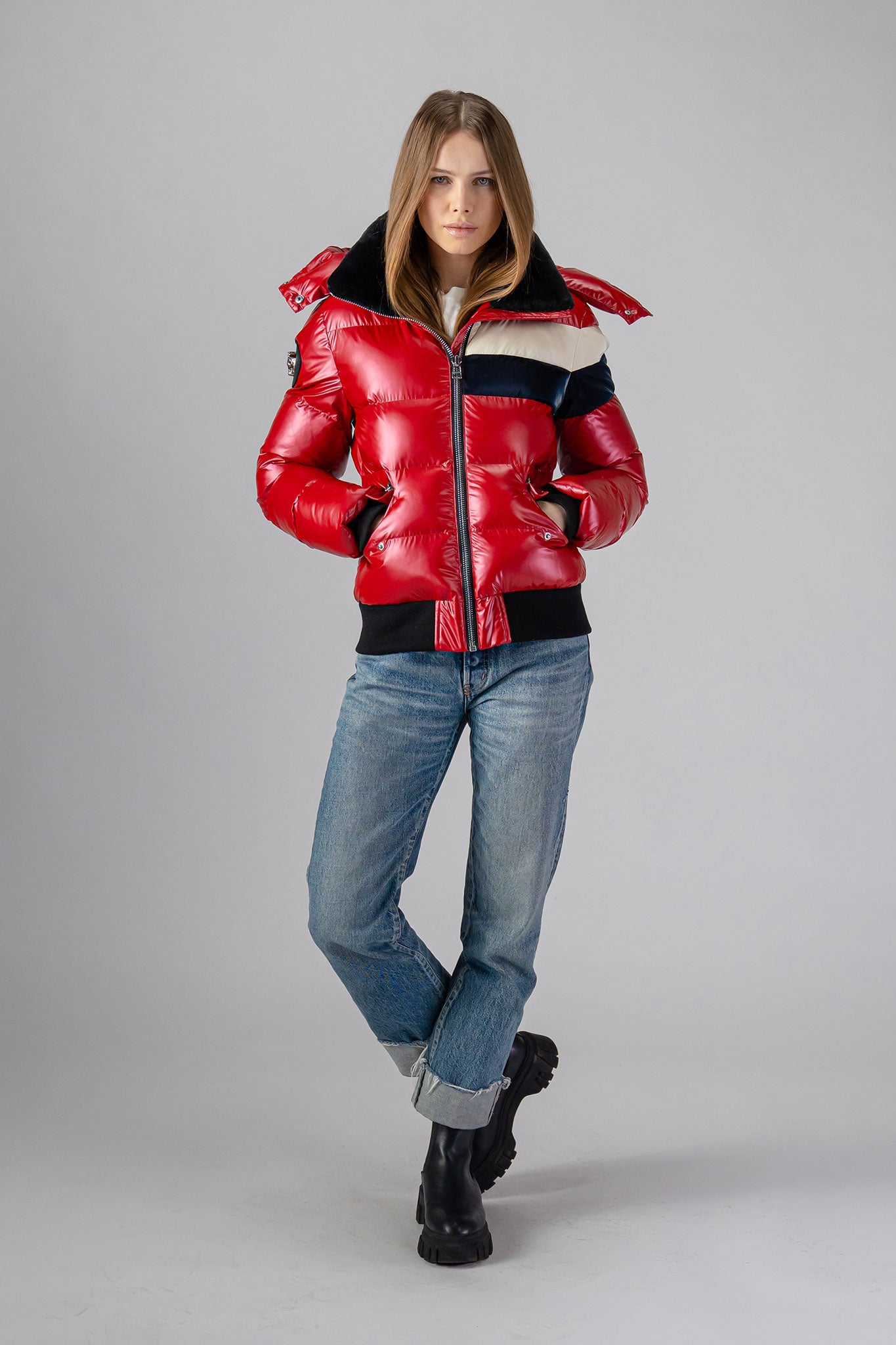 Woodpecker Women's Woody Bomber Winter coat. High-end Canadian designer winter coat for women in "Red White Blue" colour. Woodpecker cruelty-free winter coat designed in Canada. Women's heavy weight short length premium designer jacket for winter. Superior quality warm winter coat for women. Moose Knuckles, Canada Goose, Mackage, Montcler, Will Poho, Willbird, Nic Bayley. Shiny parka. Stylish winter jacket. Designer winter coat.