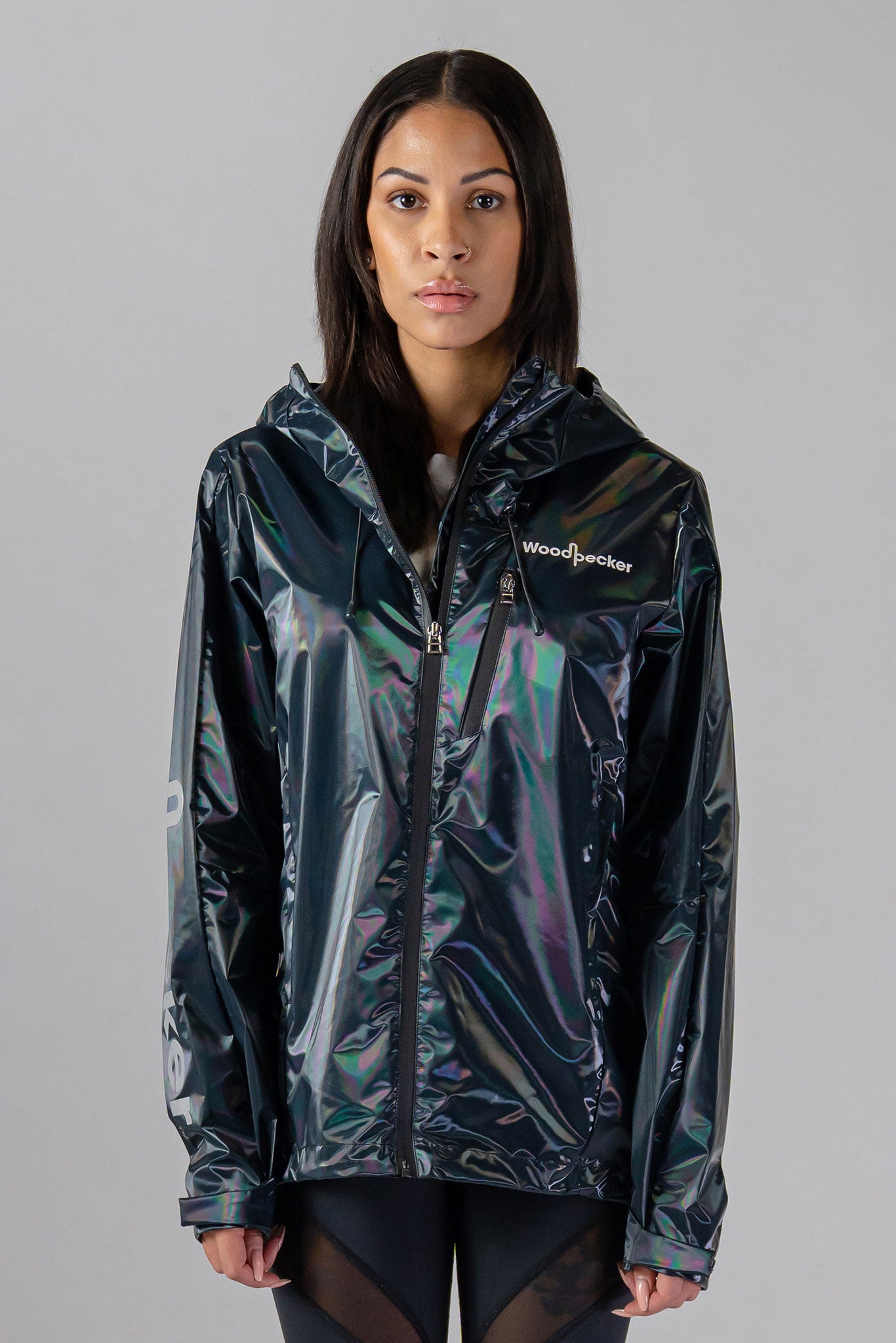 Woodpecker Women's Wind Shell coat. High-end Canadian designer activewear coat for women in "Raven Black" colour. Woodpecker coat designed in Canada. Moose Knuckles, Canada Goose, Mackage, Montcler, Will Poho, Willbird, Nic Bayley.