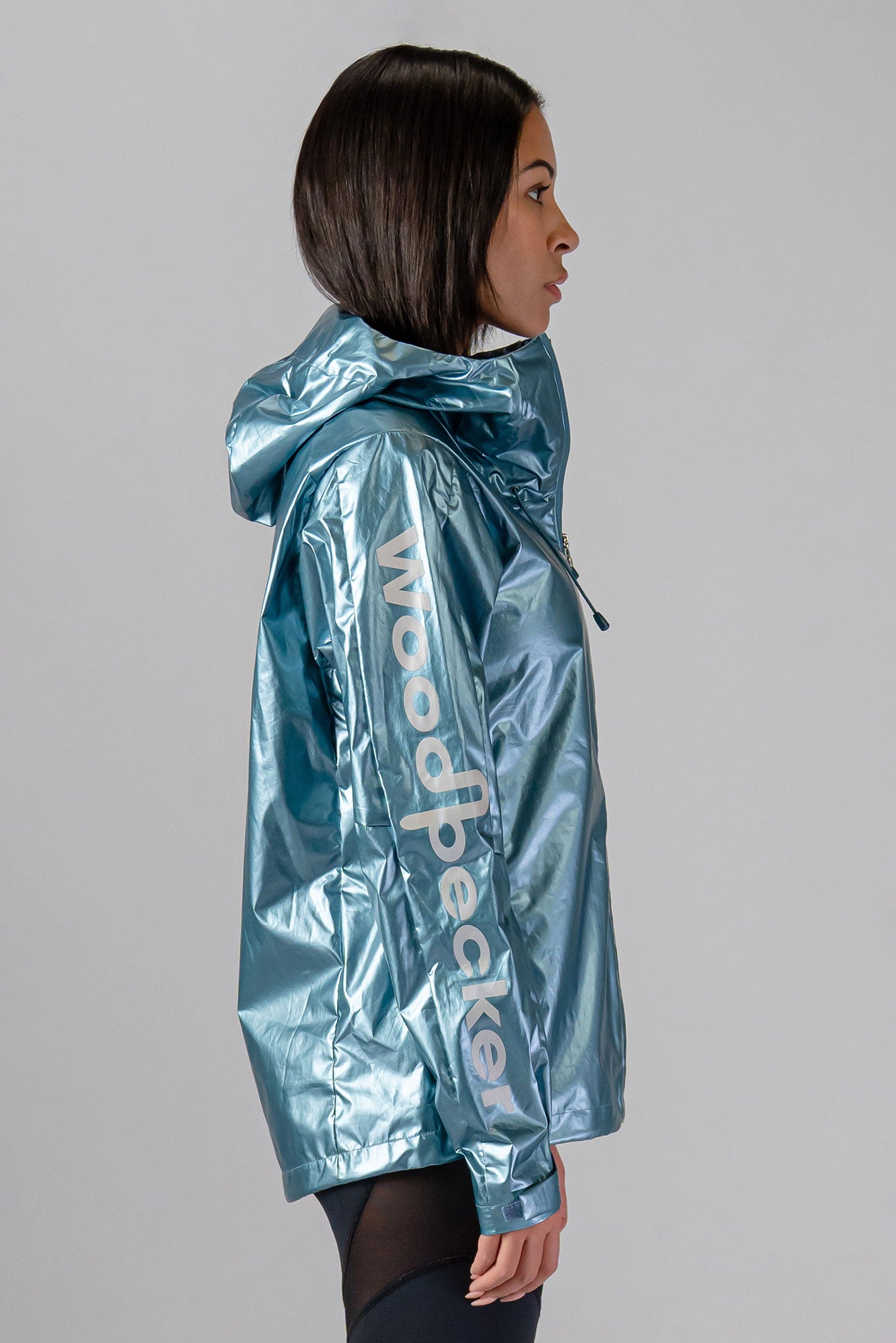 Woodpecker Women's Wind Shell coat. High-end Canadian designer activewear coat for women in "Spearmint" colour. Woodpecker coat designed in Canada. Moose Knuckles, Canada Goose, Mackage, Montcler, Will Poho, Willbird, Nic Bayley.