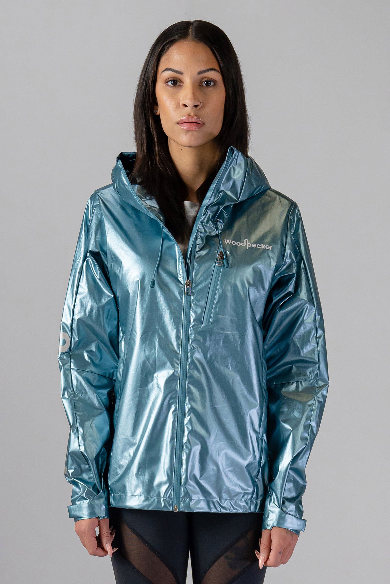 Woodpecker Women's Wind Shell coat. High-end Canadian designer activewear coat for women in "Spearmint" colour. Woodpecker coat designed in Canada. Moose Knuckles, Canada Goose, Mackage, Montcler, Will Poho, Willbird, Nic Bayley.