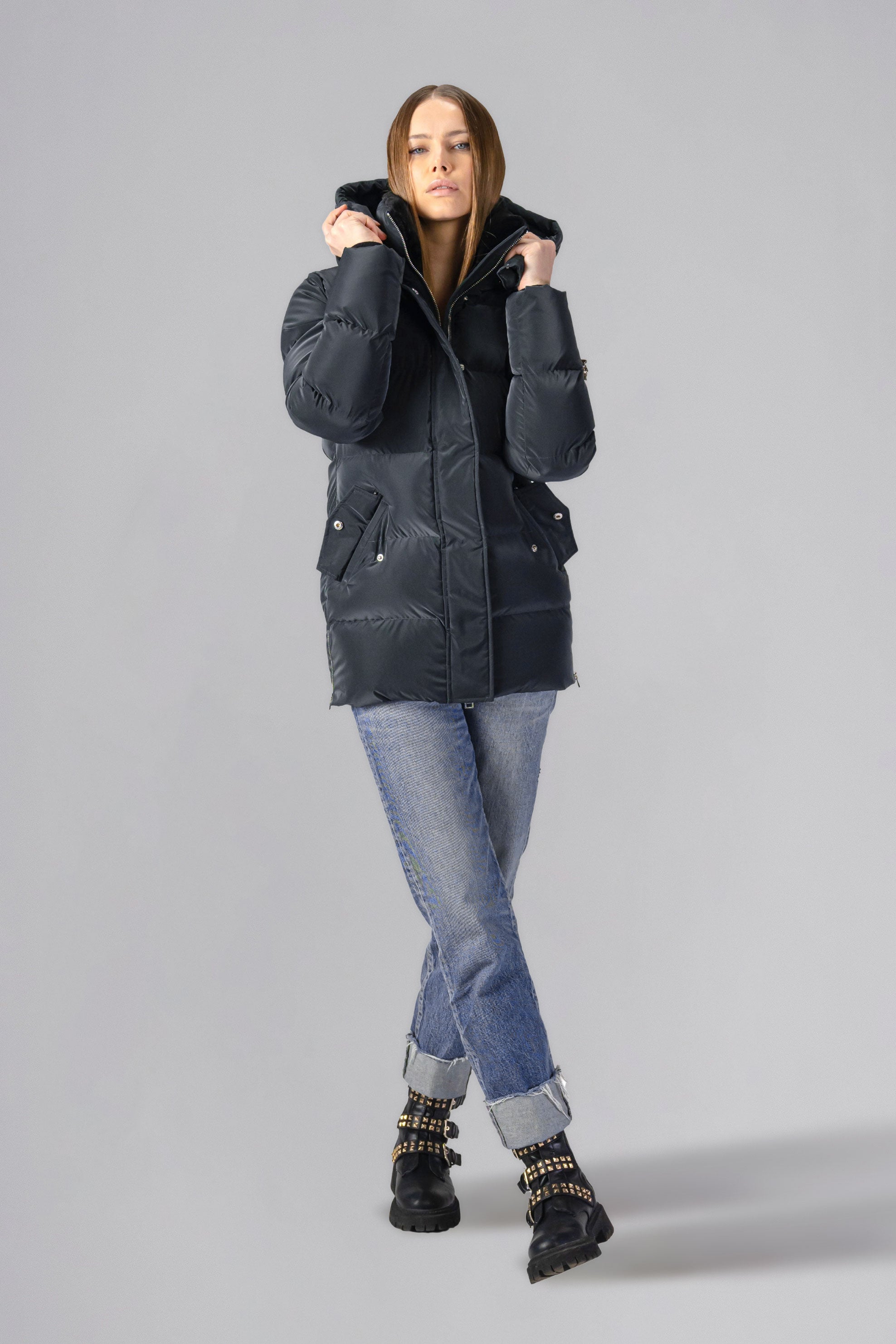 Woodpecker Women's Bumnester Winter coat. High-end Canadian designer winter coat for women in shiny "Black Diamond" colour. Woodpecker cruelty-free winter coat designed in Canada. Women's heavy weight medium length premium designer jacket for winter. Superior quality warm winter coat for women. Moose Knuckles, Canada Goose, Mackage, Montcler, Will Poho, Willbird, Nic Bayley. Extra warm. Shiny parka. Stylish winter jacket. Designer winter coat.