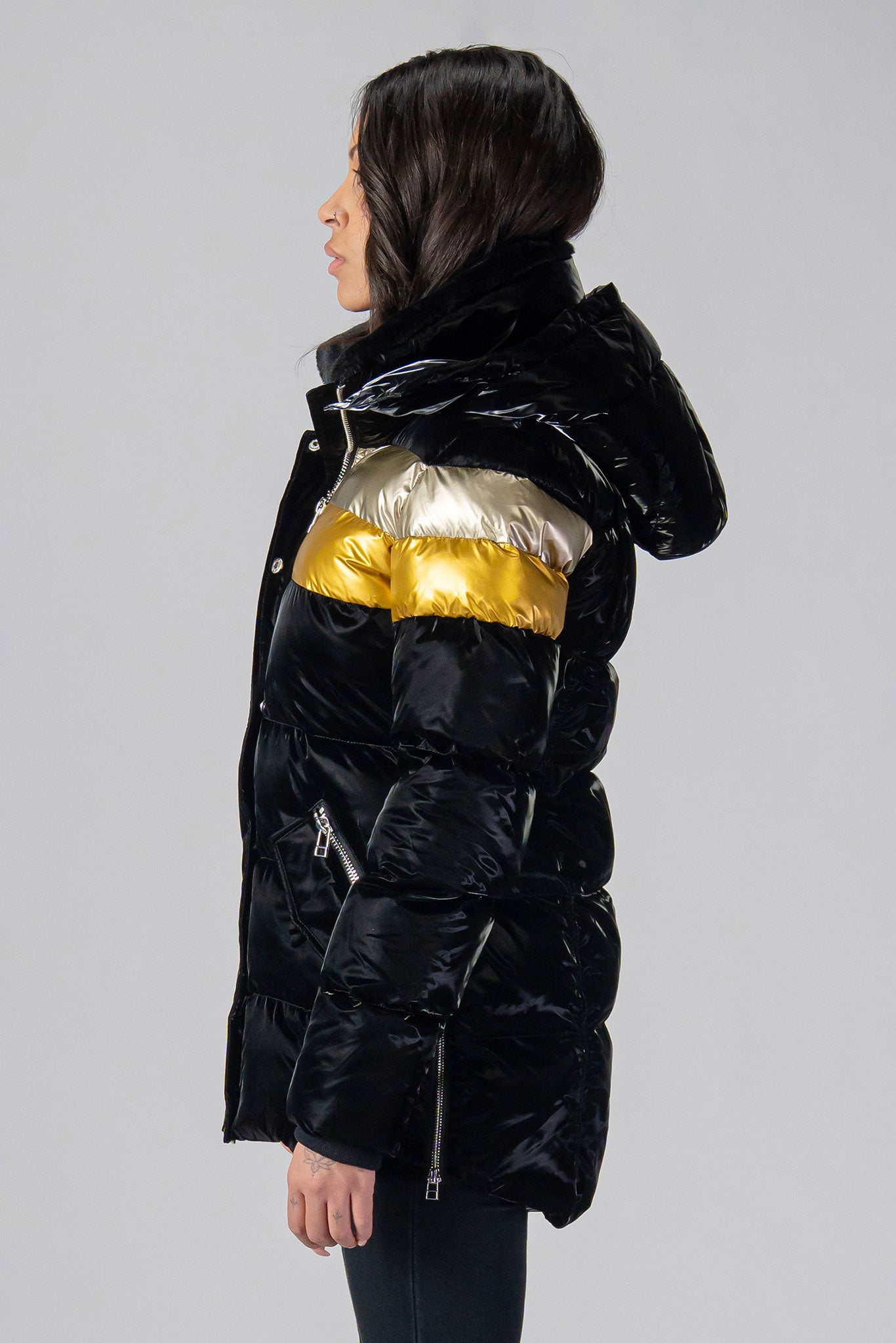 Woodpecker Women's Bumnester Winter coat. High-end Canadian designer winter coat for women in shiny "Firebird" colour. Woodpecker cruelty-free winter coat designed in Canada. Women's heavy weight medium length premium designer jacket for winter. Superior quality warm winter coat for women. Moose Knuckles, Canada Goose, Mackage, Montcler, Will Poho, Willbird, Nic Bayley. Extra warm. Shiny parka. Stylish winter jacket. Designer winter coat.