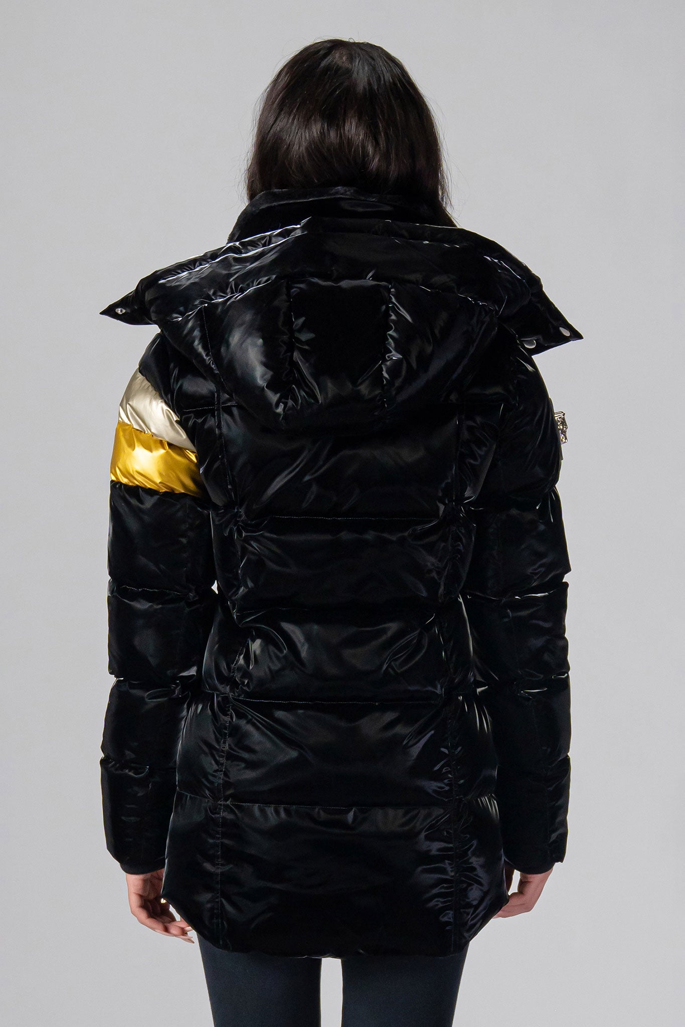 Woodpecker Women's Bumnester Winter coat. High-end Canadian designer winter coat for women in shiny "Firebird" colour. Woodpecker cruelty-free winter coat designed in Canada. Women's heavy weight medium length premium designer jacket for winter. Superior quality warm winter coat for women. Moose Knuckles, Canada Goose, Mackage, Montcler, Will Poho, Willbird, Nic Bayley. Extra warm. Shiny parka. Stylish winter jacket. Designer winter coat.