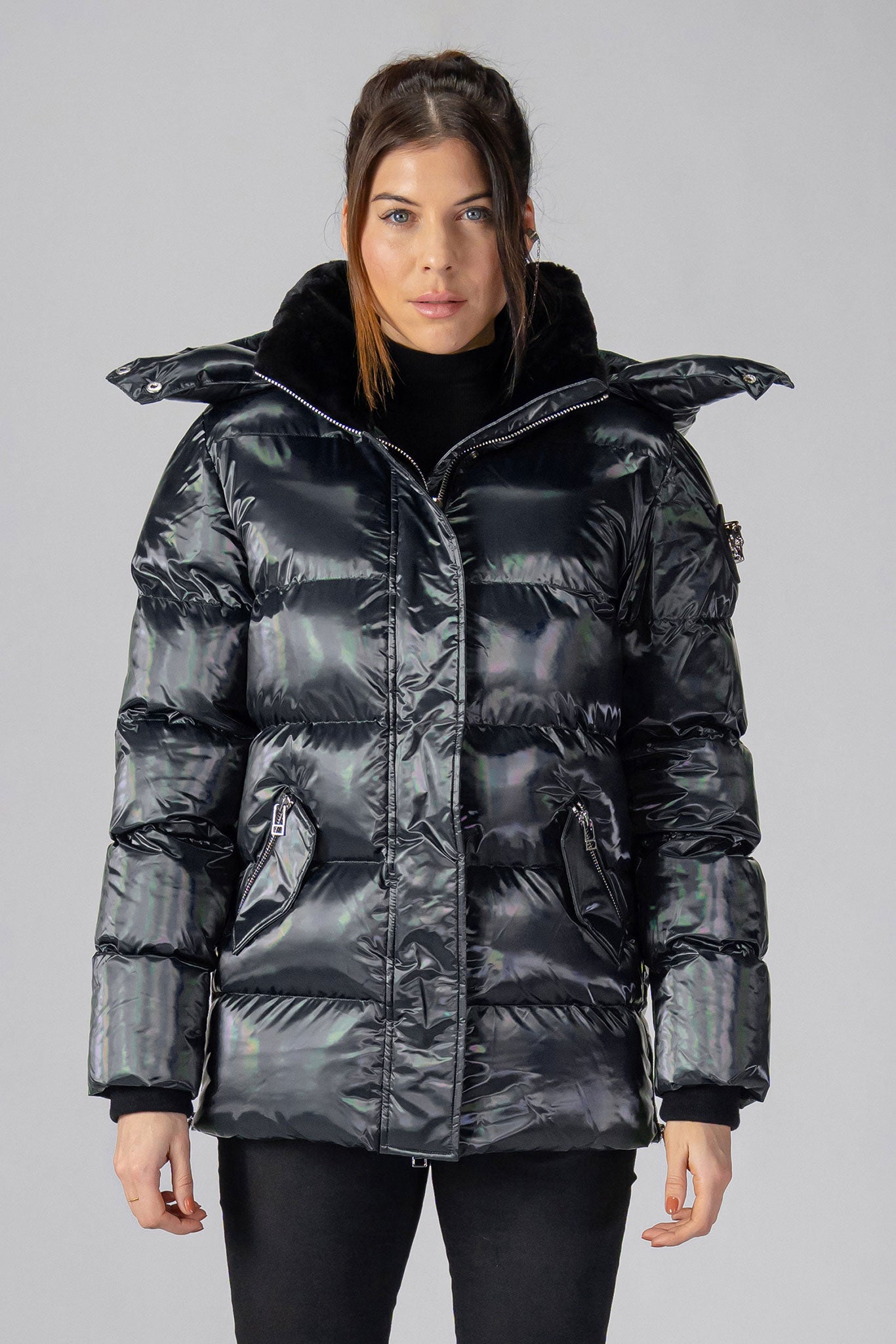 Woodpecker Women's Bumnester Winter coat. High-end Canadian designer winter coat for women in "Oily Black" colour. Woodpecker cruelty-free winter coat designed in Canada. Women's heavy weight medium length premium designer jacket for winter. Superior quality warm winter coat for women. Moose Knuckles, Canada Goose, Mackage, Montcler, Will Poho, Willbird, Nic Bayley. Extra warm. Shiny parka. Stylish winter jacket. Designer winter coat.