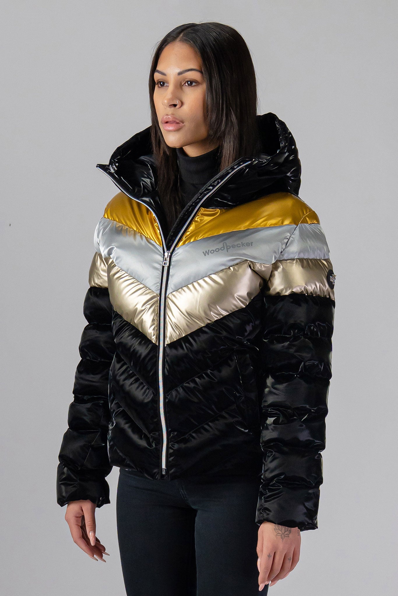Woodpecker Women's Robin Winter coat. High-end Canadian designer winter coat for women in "Firebird" colour. Woodpecker cruelty-free winter coat designed in Canada. Women's medium weight medium length premium designer jacket for winter. Superior quality warm winter coat for women. Moose Knuckles, Canada Goose, Mackage, Montcler, Will Poho, Willbird, Nic Bayley. Extra warm. Shiny parka. Stylish winter jacket. Designer winter coat.