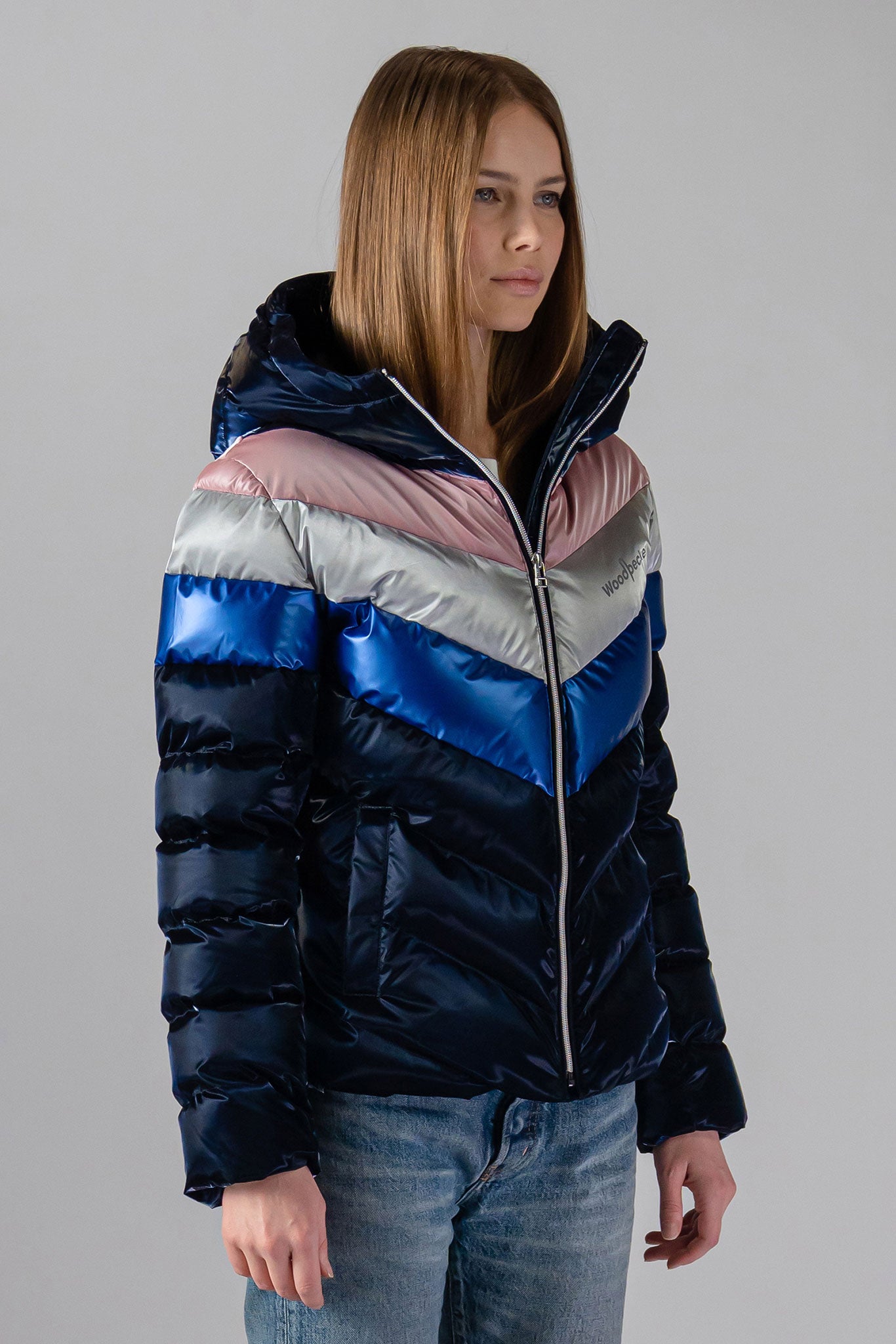 Woodpecker Women's Robin Winter coat. High-end Canadian designer winter coat for women in "Thunder Bird" colour. Woodpecker cruelty-free winter coat designed in Canada. Women's medium weight medium length premium designer jacket for winter. Superior quality warm winter coat for women. Moose Knuckles, Canada Goose, Mackage, Montcler, Will Poho, Willbird, Nic Bayley. Extra warm. Shiny parka. Stylish winter jacket. Designer winter coat.