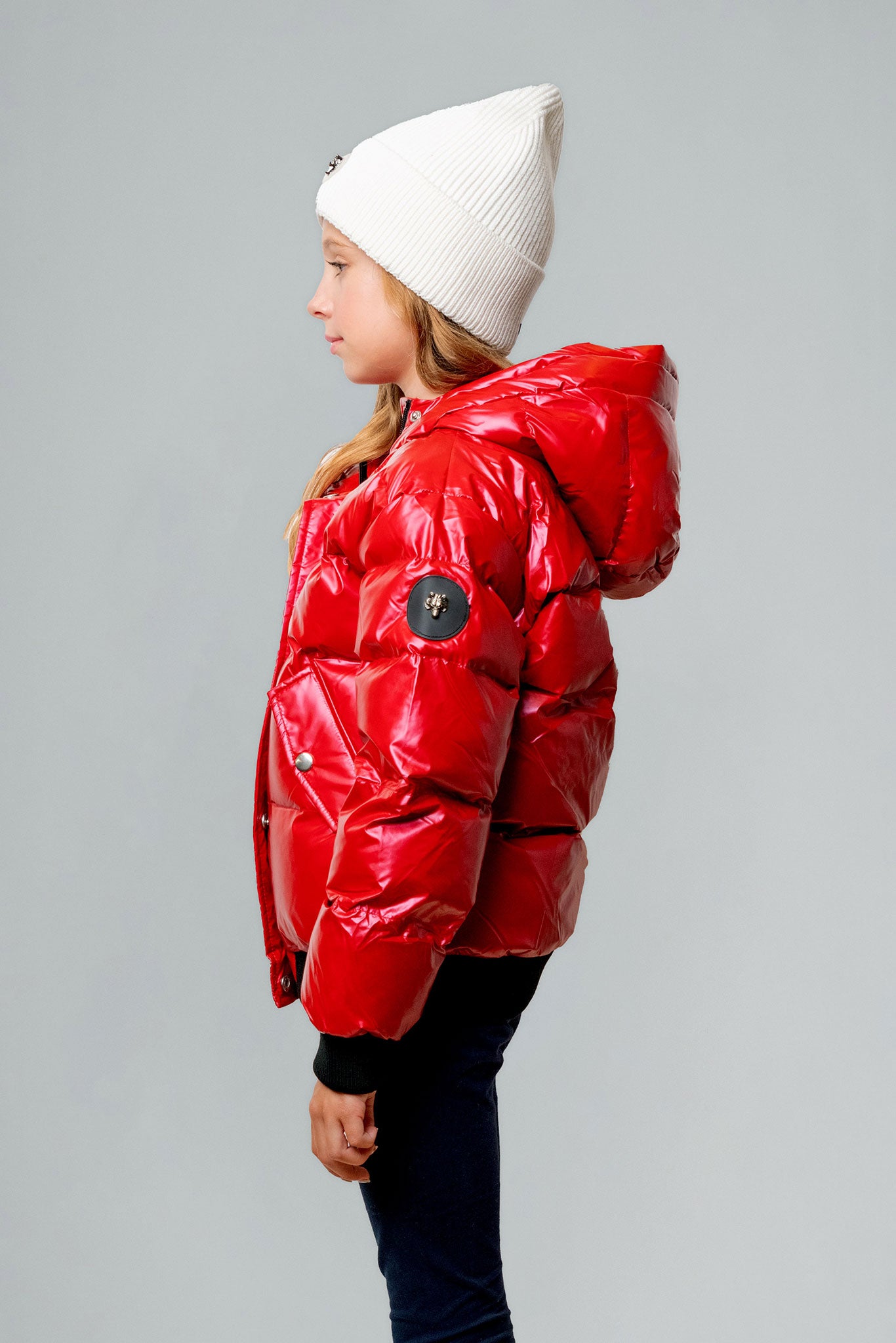 Woodpecker Kids' Chickadee Winter coat. High-end Canadian designer winter coat for Kids in "Raspberry" colour. Woodpecker cruelty-free winter coat designed in Canada. Kids' heavy weight short length premium designer jacket for winter. Superior quality warm winter coat for kids. Moose Knuckles, Canada Goose, Mackage, Montcler, Will Poho, Willbird, Nic Bayley. Extra warm. Shiny parka. Stylish winter jacket. Designer winter coat.